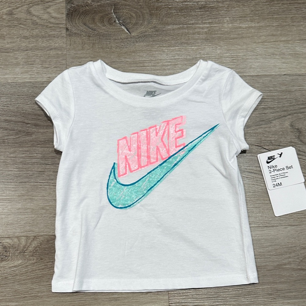 Nike Kids Tee with Pink and Blue Logo